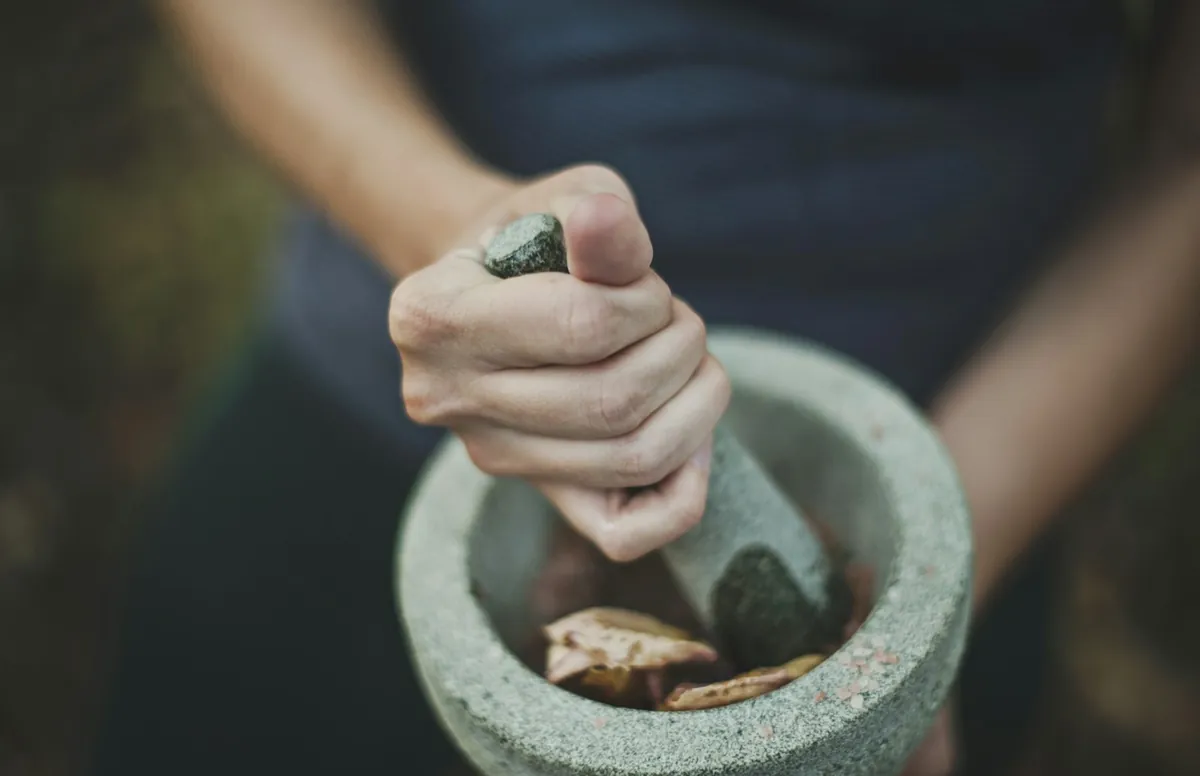 Preparing a natural remedy with a mortar and pestle